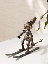 Load image into Gallery viewer, Vintage Brutalist metal skier figure made from welded springs, nuts, bolts, and repurposed metal parts