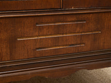 Load image into Gallery viewer, Close-up of a dark brown wooden dresser with three drawers, featuring horizontal bar handles and a warm wood grain finish.