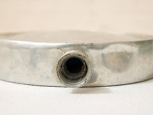 Load image into Gallery viewer, Close-up of a metallic silver circular component with a threaded hole, resting on a white textured surface.