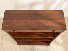 Load image into Gallery viewer, Antique tall wood bookshelf with four open shelves, upper drawer, round metal pulls, and turned front feet