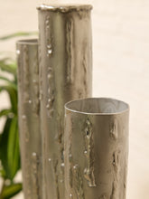 Load image into Gallery viewer, Brutalist welded steel sculpture with vertical tubular pipes of varying heights on a square metal base