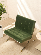 Load image into Gallery viewer, Vintage Barcelona-style lounge chair with olive green button-tufted seat and back, polished metal frame, and support straps