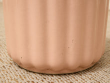 Load image into Gallery viewer, Vintage blush pink glazed ceramic planter with vertical fluting and scalloped wavy rim