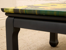 Load image into Gallery viewer, Vintage square side table with swirling yellow, orange, teal, and black marbled abstract top and dark curved-leg base