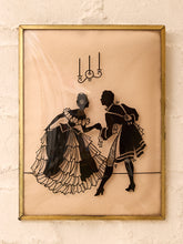 Load image into Gallery viewer, Vintage framed silhouette artwork of elegantly dressed Victorian-style couple in black on a blush background with gold-tone frame
