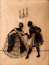 Load image into Gallery viewer, Vintage framed silhouette artwork of elegantly dressed Victorian-style couple in black on a blush background with gold-tone frame