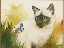 Load image into Gallery viewer, A framed painting of a white and brown Siamese cat with blue eyes, surrounded by green and yellow foliage, with a small blue butterfly near the cat's side.