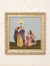 Load image into Gallery viewer, Vintage framed needlepoint artwork depicting a mother and child with a winged angel, colorful garments, halo, and ornate gold-tone frame