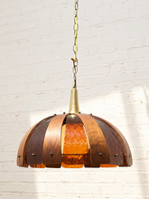 Load image into Gallery viewer, 1970s Mid-Century dome hanging lamp with curved dark wood ribs, amber acrylic panels, metal studs, and chain suspension