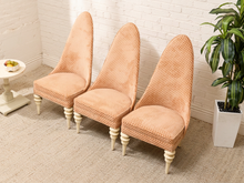 Load image into Gallery viewer, Peach checkered upholstered Hollywood Regency slipper chair with tall arched back, cushioned seat, and cream-painted legs