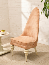 Load image into Gallery viewer, Peach checkered upholstered Hollywood Regency slipper chair with tall arched back, cushioned seat, and cream-painted legs