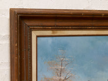 Load image into Gallery viewer, Close-up of a framed artwork showing part of a painted tree scene with blue sky, set in a dark brown wooden frame against a white textured wall.