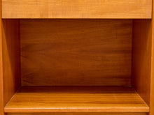 Load image into Gallery viewer, Close-up of a wooden shelf or cabinet interior with a warm medium-brown wood finish and visible grain.