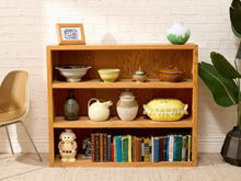 Load image into Gallery viewer, Vintage oak open bookshelf with three wide shelves, warm natural wood grain, visible knots, and simple rectangular construction