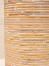 Load image into Gallery viewer, Close-up of a cylindrical product with tightly stacked natural bamboo or rattan rings, showing a light tan wood texture and subtle horizontal grooves.