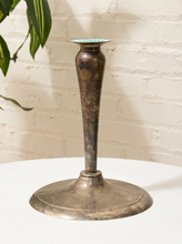 Load image into Gallery viewer, Vintage silver-tone candlestick holder with slender tapered stem, flared candle cup, broad round base, and aged patina