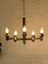 Load image into Gallery viewer, Vintage chrome-tone five-arm Sputnik chandelier with geometric rectangular arms, exposed candle-style bulbs, central column, chain, and ceiling canopy
