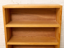 Load image into Gallery viewer, Vintage narrow wood media storage shelf with multiple closely spaced open shelves and warm natural wood grain