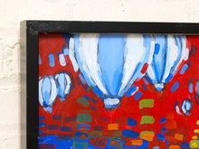 Load image into Gallery viewer, A close-up of a framed painting featuring expressive brushstrokes of red, blue, white, green, and orange, mounted against a white textured wall.
