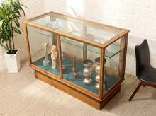 Load image into Gallery viewer, Art Deco tiger oak mercantile display cabinet with glass top and large glass panels framed in richly figured warm oak