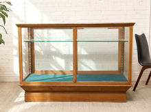 Load image into Gallery viewer, Art Deco tiger oak mercantile display cabinet with glass top and large glass panels framed in richly figured warm oak