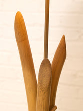 Load image into Gallery viewer, A close-up of several light brown wooden utensils or tools with smooth, tapered ends, arranged vertically against a softly blurred light beige background.