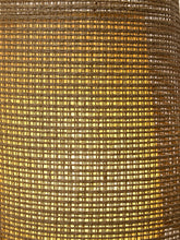 Load image into Gallery viewer, Close-up of a woven lampshade or diffuser made from natural brown and golden-yellow fibers, showing a detailed texture of horizontal and vertical weave patterns.