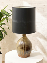 Load image into Gallery viewer, Vintage table lamp with rounded earthy brown and gray drip-glaze base and large black drum shade