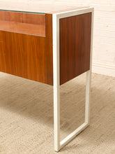 Load image into Gallery viewer, Danish modern wood jewelry display case with clear glass top, multiple shallow drawers, and squared metal frame and legs