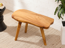 Load image into Gallery viewer, Vintage live edge wood side table with irregular natural wood tabletop, honey-brown grain, visible knots, and three tapered wooden legs