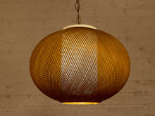 Load image into Gallery viewer, Vintage hanging pendant light with large rounded brown woven globe shade and decorative metal chain