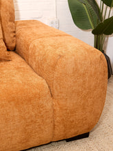 Load image into Gallery viewer, Felipe modern lounge chair in warm terracotta textured upholstery with deep channel-tufted seat, oversized padded arms, rounded silhouette, and coordinating cushions