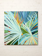 Load image into Gallery viewer, Image 1 of 8: Contemporary tropical botanical painting by Jean Bradley featuring overlapping fan-shaped palm leaves in pale blue, sage green, cream, and yellow with coral orange accents against a deep blue background.