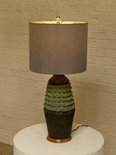 Load image into Gallery viewer, Image 4 of 17: Vintage table lamp with light gray drum shade and textured sage green and charcoal brown sculptural base
