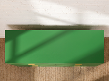 Load image into Gallery viewer, Image 4 of 15: Vintage four-drawer dresser featuring a vibrant Kelly green painted finish, long rectangular silhouette, four wide drawers with brass-tone rectangular pulls, smooth flat top, and low-profile base.