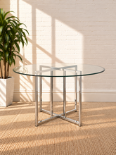 Load image into Gallery viewer, Image 2 of 4: Tavi 48-inch round dining table with clear tempered glass top and geometric Chrome metal base