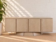 Load image into Gallery viewer, Image 1 of 5: Thera 4-Door Buffet Credenza in Blonde Oak with sculptural curved base and Art Deco detailing