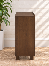 Load image into Gallery viewer, Veda dark oak bar cabinet with vertical striped oak and walnut veneer doors and raised wood base