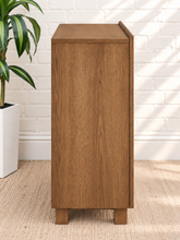 Load image into Gallery viewer, Veda warm oak bar cabinet with alternating vertical oak and walnut veneer striped doors and raised wood legs