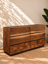 Load image into Gallery viewer, Image 3 of 4: Velez 6-Drawer Mahogany Dresser in Natural Walnut with live edge-style wood grain drawer fronts and floating base