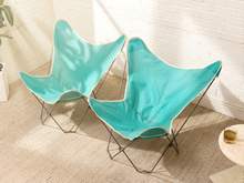 Load image into Gallery viewer, Pair of vintage aqua butterfly chairs with turquoise fabric sling seats, white trim, and slender metal frames