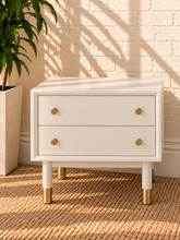 Load image into Gallery viewer, Image 1 of 4: Yvette 2-drawer side table in Chalk White with polished gold details and elevated legs