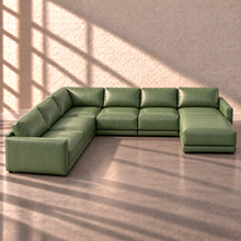 Load image into Gallery viewer, Image 5 of 18: Simulated Orinda large modular leather sectional with a long left seating return and integrated right-arm chaise with one continuous seat cushion, in sage green Sequoia Rainforest leather without accent pillows.
