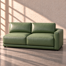 Load image into Gallery viewer, Image 18 of 18: Simulated Orinda individual 75-inch right-arm two-seat sofa section in sage green Sequoia Rainforest leather, without accent pillows, in the Sunbeam white brick setting.