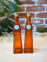 Load image into Gallery viewer, Vintage Orange Glass Bottle