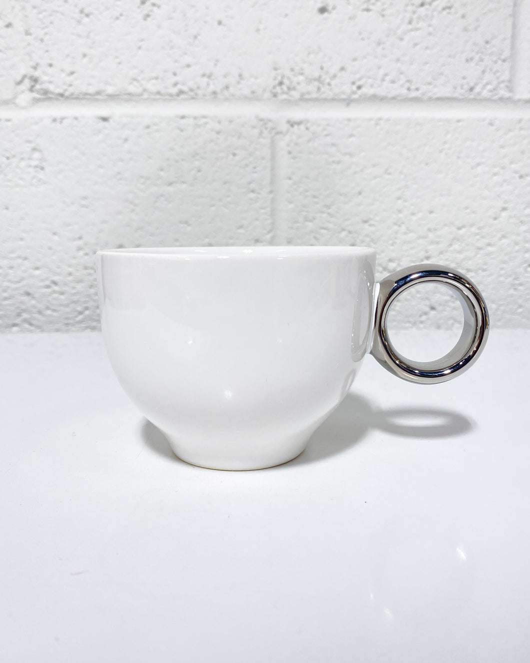 White Coffee Cup with Silver Ring Handle