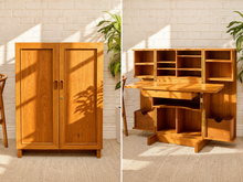 Load image into Gallery viewer, A split view of a wooden writing desk cabinet in two positions: on the left, it is shown closed as a two-door cabinet; on the right, the desk surface extends out, showing shelves, drawers, and storage compartments. The furniture is styled in a bright room with a white brick wall, beige carpet, and green plants.

