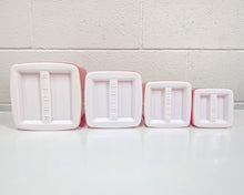 Load image into Gallery viewer, Vintage 4 Piece Plastic Canister Set
