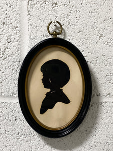 Vintage Silhouette of a Young Child
