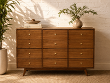 Load image into Gallery viewer, Handmade Sunbeam Vintage walnut 12-drawer dresser with round brass-tone knobs, clean mid-century lines and tapered wood legs.
